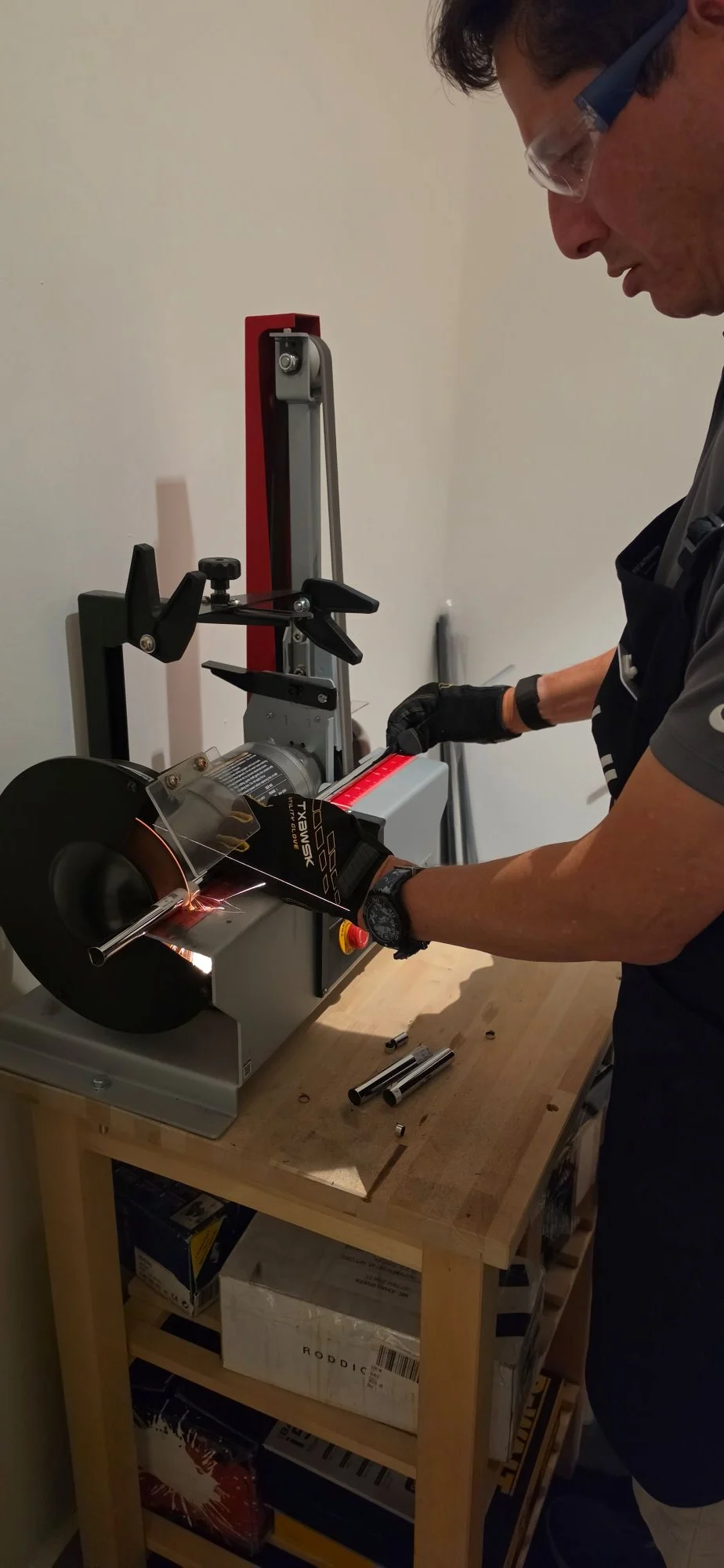 Johan Rivera carrying out clubmaking work at ASUBURE workshop equipment
