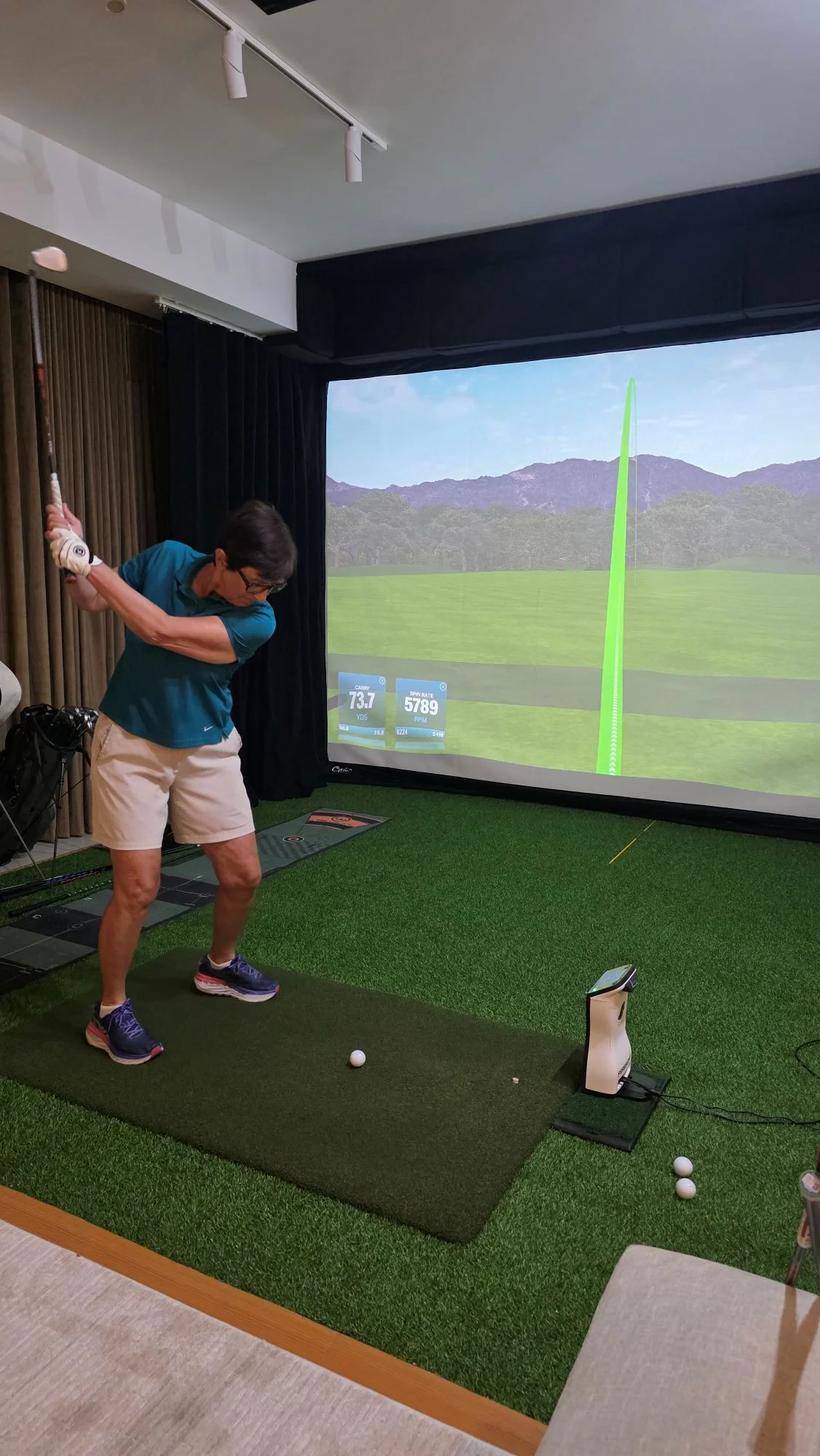 A golfer being observed during an ASUBURE fitting and measurement session