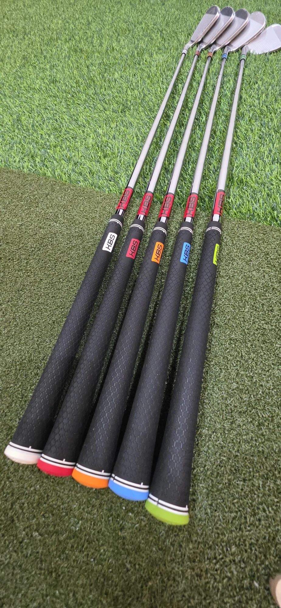 Completed TaylorMade irons with coordinated grips and KBS shafts